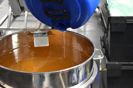 Pharmaceutical grade ingredients being mixed.