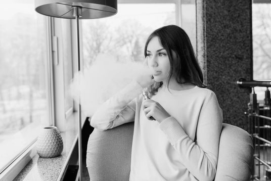 Woman vaping stock image black and white