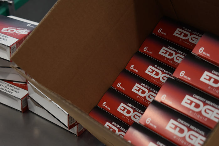 EDGE Cherry Menthol 6mg being packed in to cartons